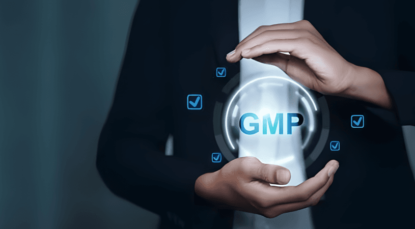 GMP Certification Guide EU US 2026 | Pharma Now Hands holding a glowing GMP sphere with blue checkmarks representing GMP certification standards