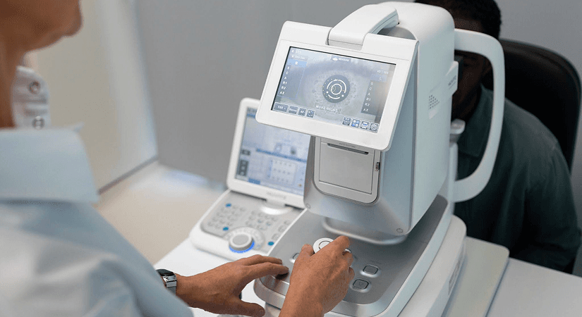 ISO 13485 Quality Management System | Pharma & Medical Device Leaders Guide Medical device equipment being operated in a clinical setting for ISO 13485 QMS compliance
