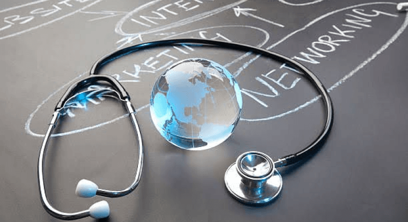 Healthcare Marketing Strategy — Trust-Led Branding Beyond Compliance — Pharma Now Stethoscope and globe on chalkboard with healthcare marketing strategy keywords — Pharma Now